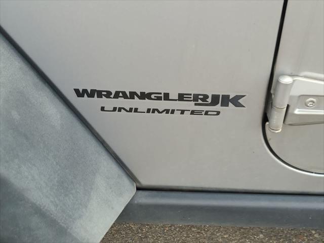 used 2018 Jeep Wrangler Unlimited car, priced at $24,998