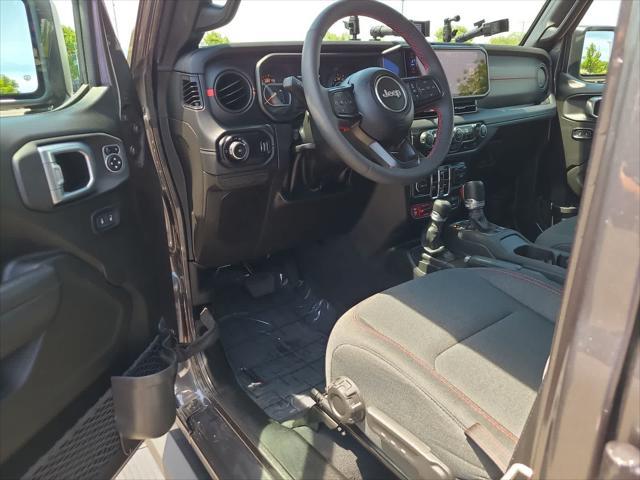 used 2024 Jeep Wrangler car, priced at $49,898