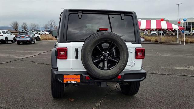 used 2021 Jeep Wrangler Unlimited car, priced at $34,498