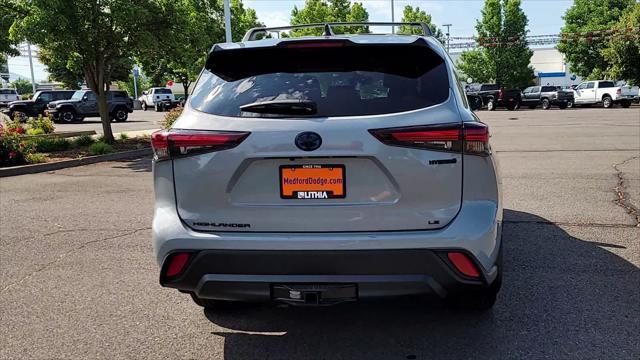 used 2024 Toyota Highlander Hybrid car, priced at $49,998