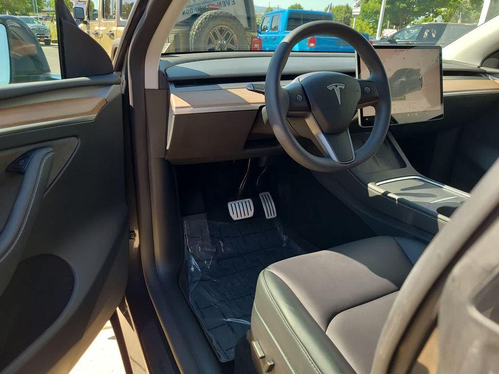 used 2024 Tesla Model Y car, priced at $39,998