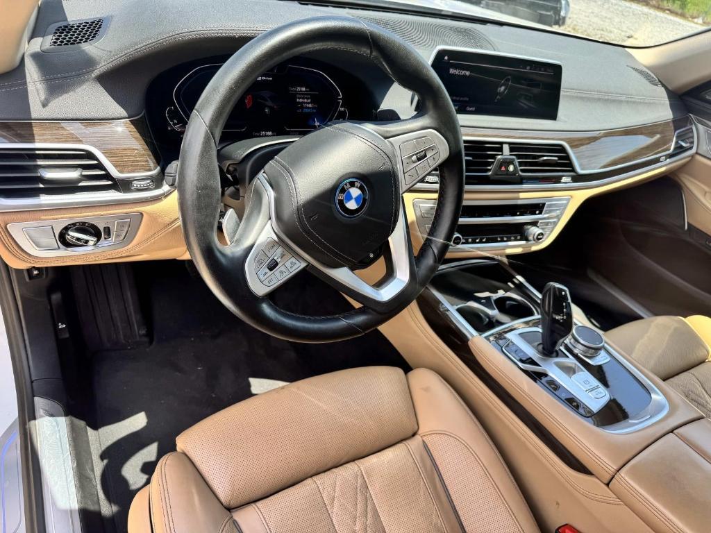 used 2022 BMW 745e car, priced at $47,249