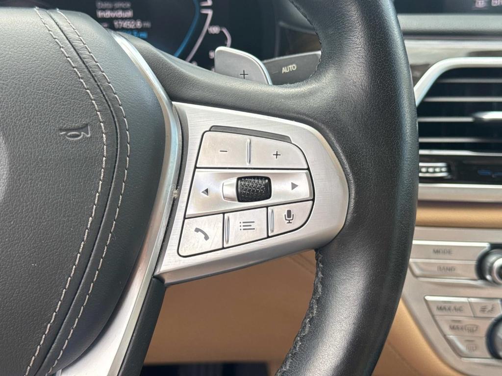 used 2022 BMW 745e car, priced at $47,249