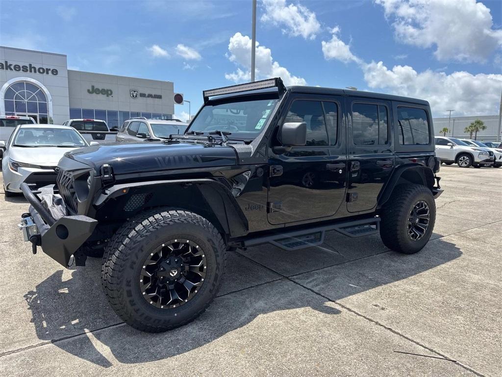 used 2021 Jeep Wrangler Unlimited car, priced at $34,128