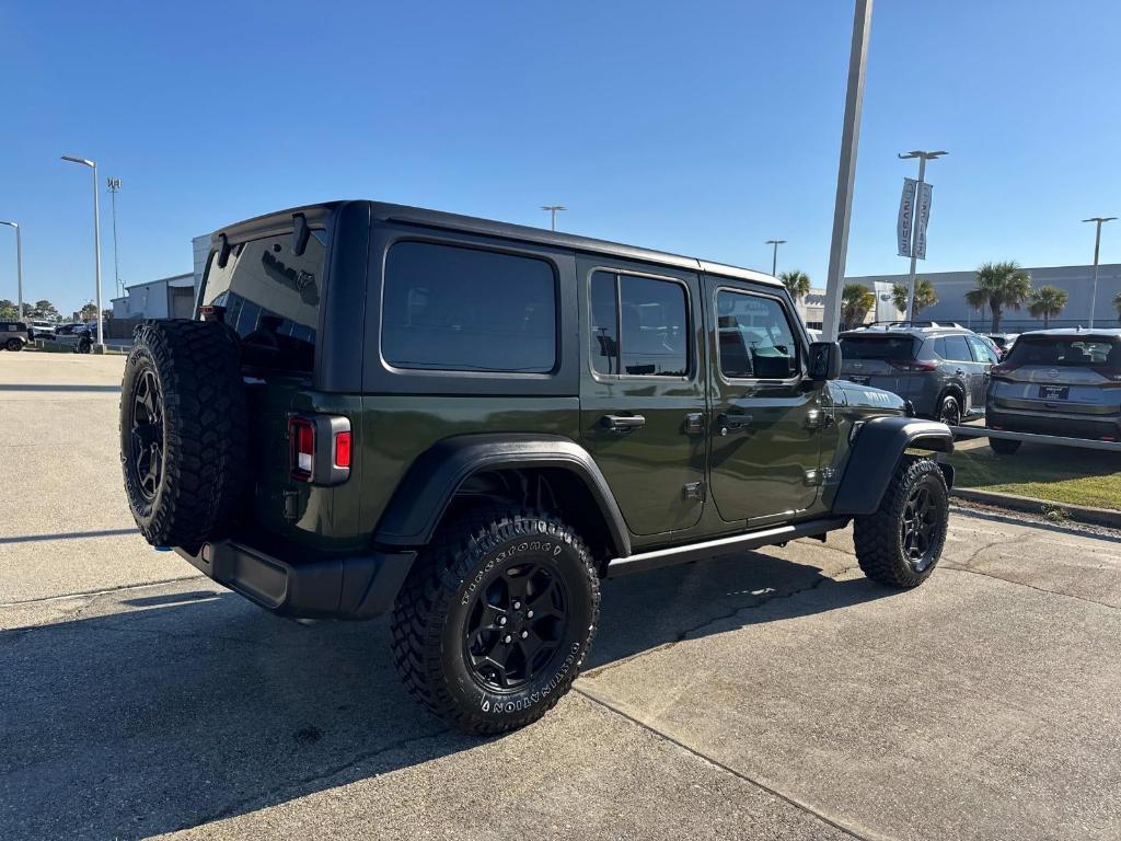 used 2023 Jeep Wrangler 4xe car, priced at $34,886