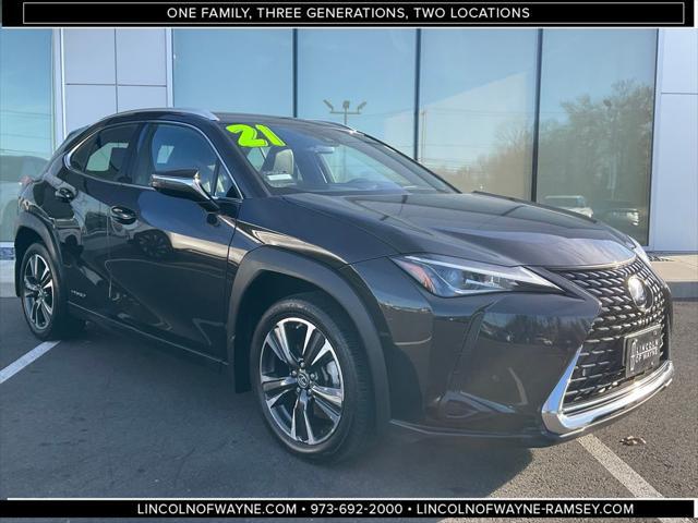 used 2021 Lexus UX 250h car, priced at $27,857