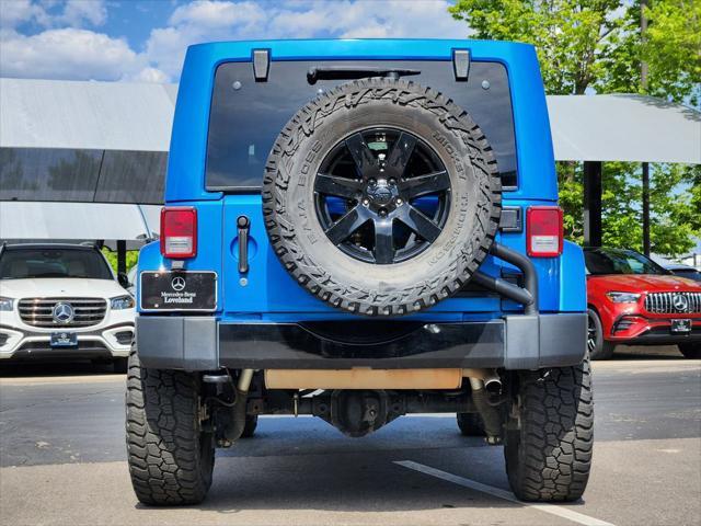 used 2014 Jeep Wrangler Unlimited car, priced at $24,300