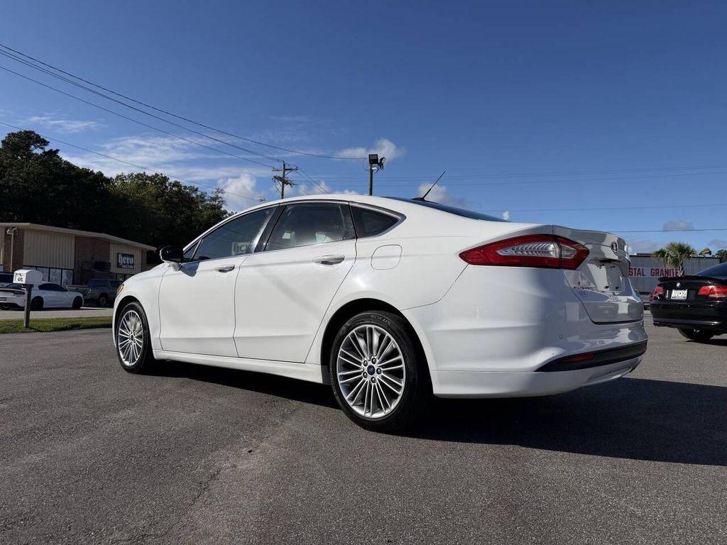 used 2014 Ford Fusion car, priced at $7,995