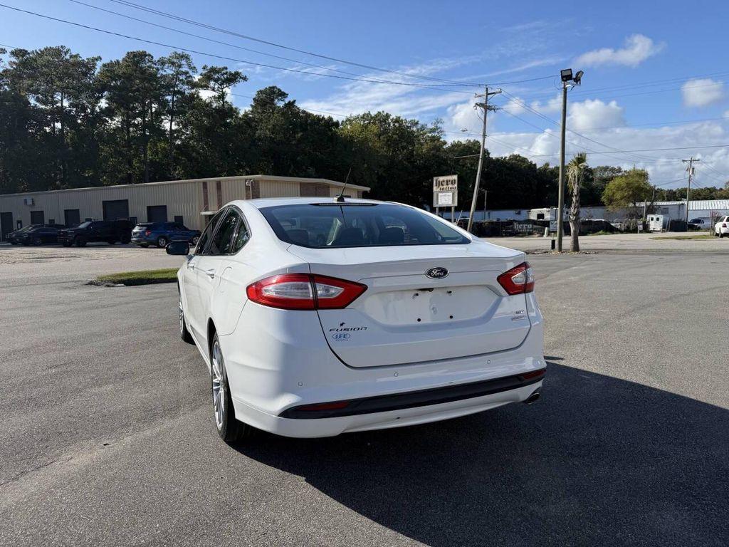 used 2014 Ford Fusion car, priced at $7,995