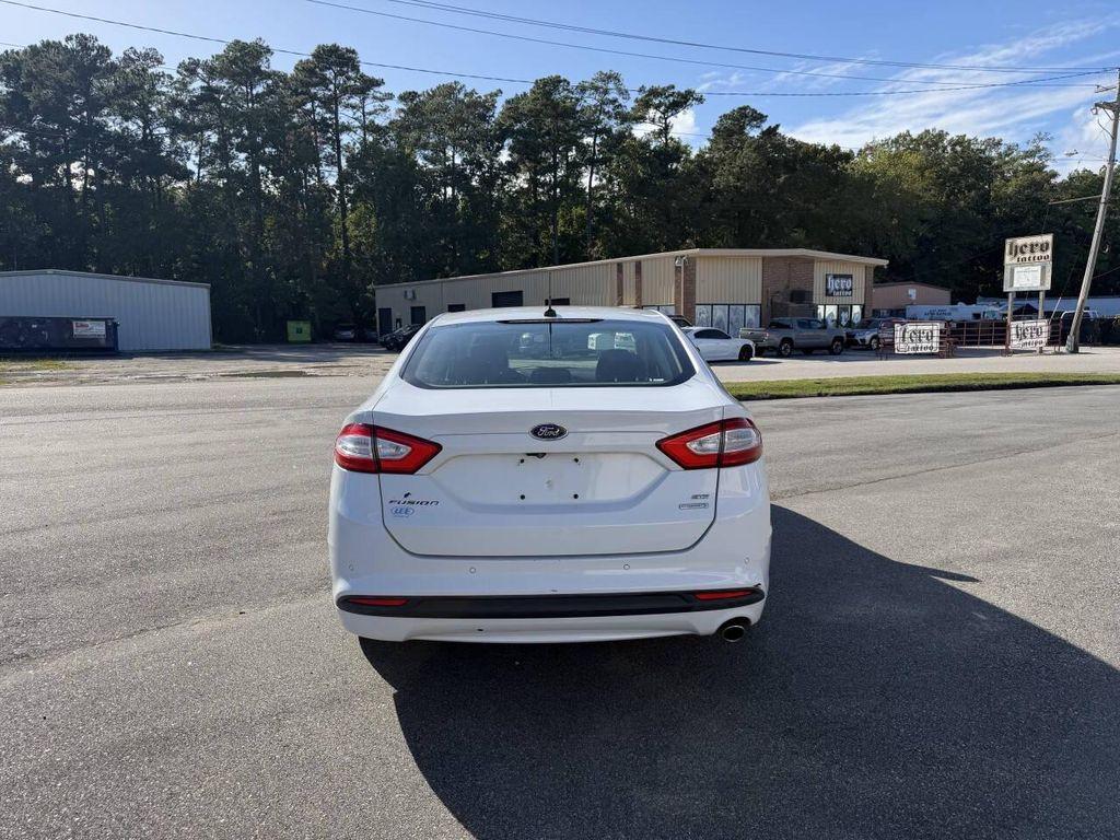 used 2014 Ford Fusion car, priced at $7,995