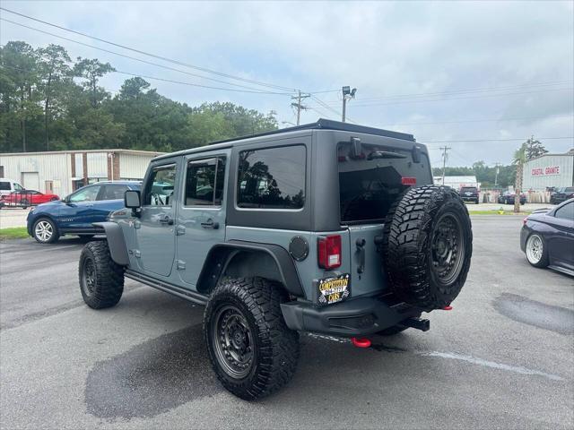 used 2013 Jeep Wrangler Unlimited car, priced at $24,900