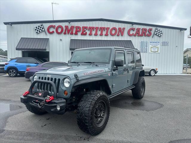 used 2013 Jeep Wrangler Unlimited car, priced at $24,900