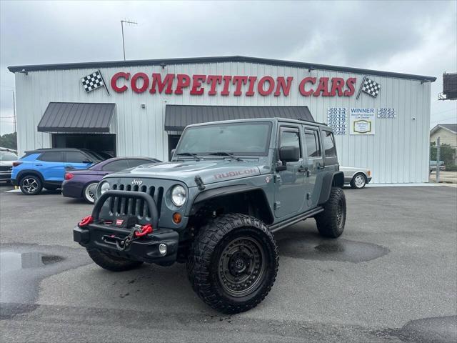 used 2013 Jeep Wrangler Unlimited car, priced at $24,900