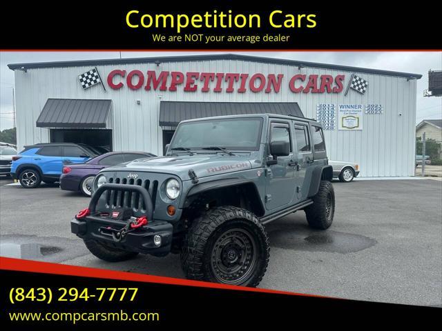 used 2013 Jeep Wrangler Unlimited car, priced at $24,900