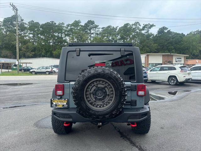 used 2013 Jeep Wrangler Unlimited car, priced at $24,900