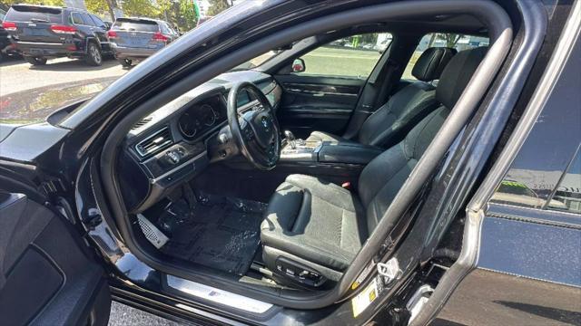 used 2015 BMW 740 car, priced at $14,995