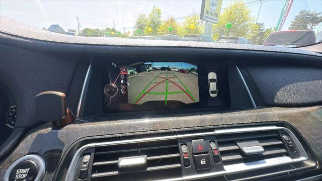 used 2015 BMW 740 car, priced at $14,995