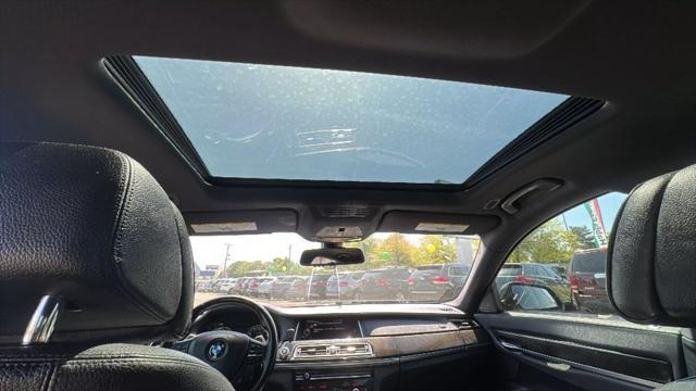 used 2015 BMW 740 car, priced at $14,995