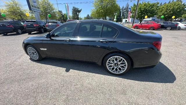 used 2015 BMW 740 car, priced at $14,995