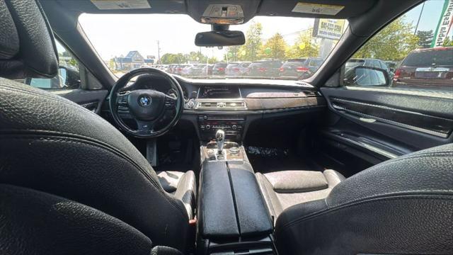 used 2015 BMW 740 car, priced at $14,995