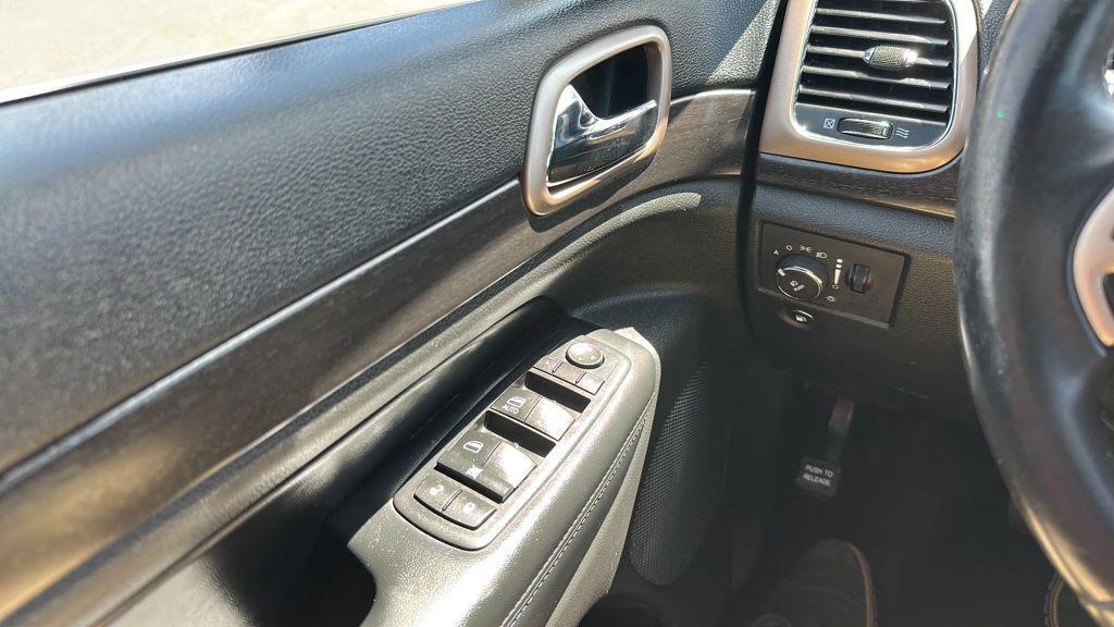 used 2016 Jeep Grand Cherokee car, priced at $13,995