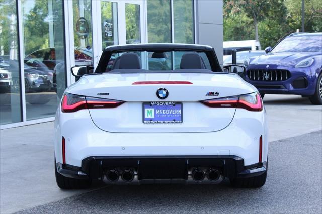 used 2024 BMW M4 car, priced at $86,900