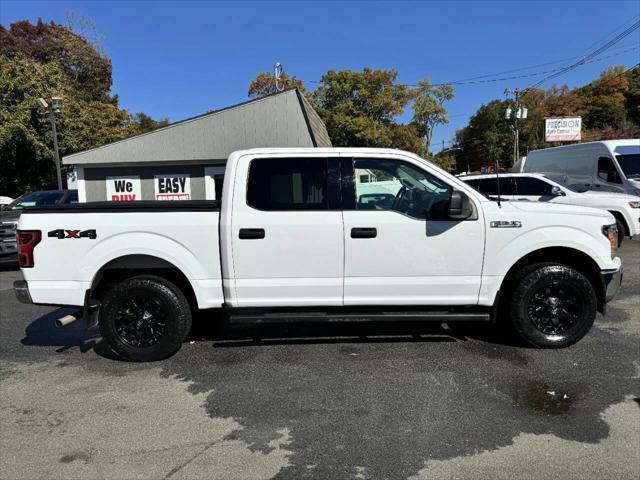 used 2018 Ford F-150 car, priced at $25,115