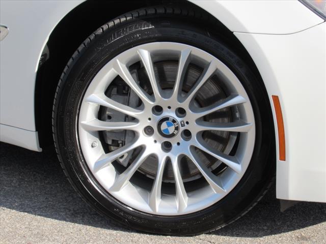 used 2011 BMW 750 car, priced at $29,170