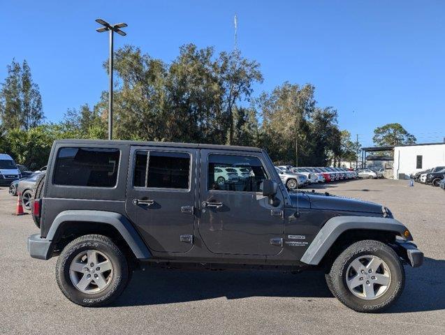 used 2017 Jeep Wrangler Unlimited car, priced at $24,945