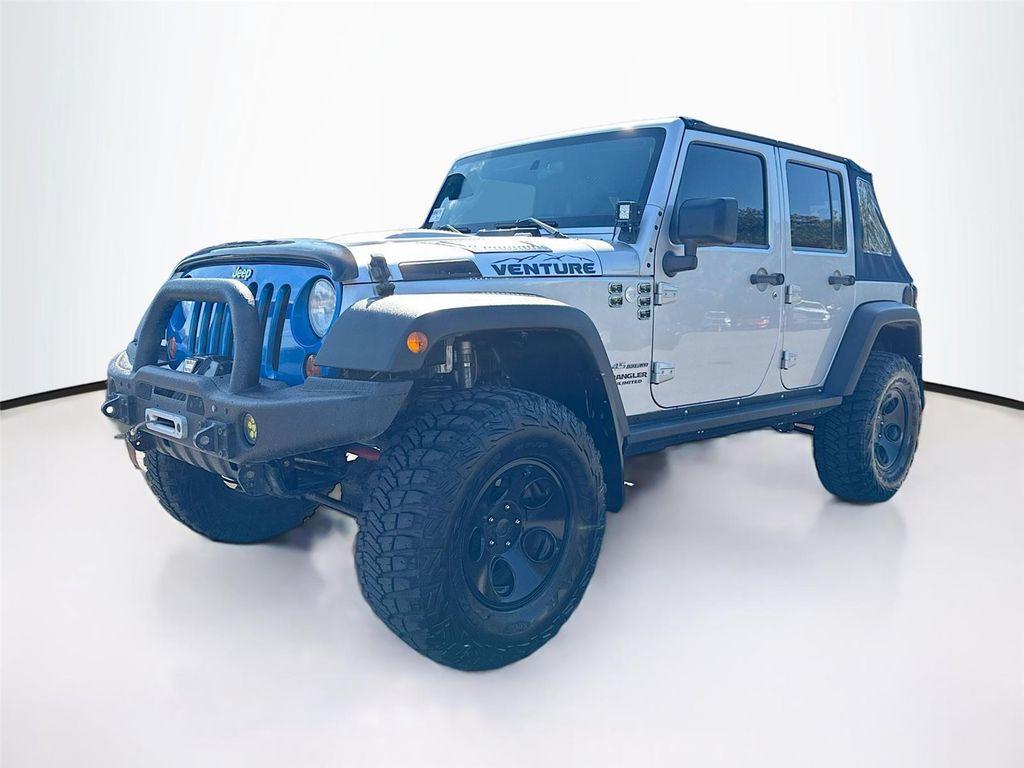 used 2011 Jeep Wrangler Unlimited car, priced at $27,000