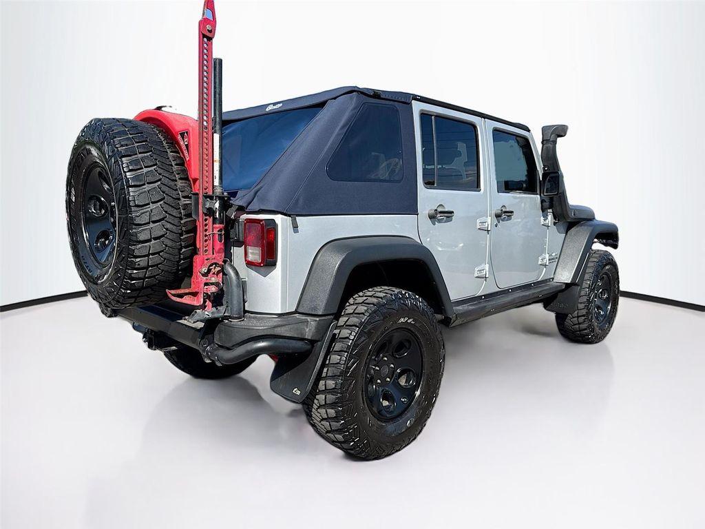 used 2011 Jeep Wrangler Unlimited car, priced at $27,000