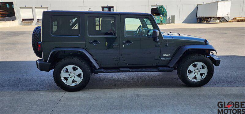 used 2010 Jeep Wrangler Unlimited car, priced at $13,995