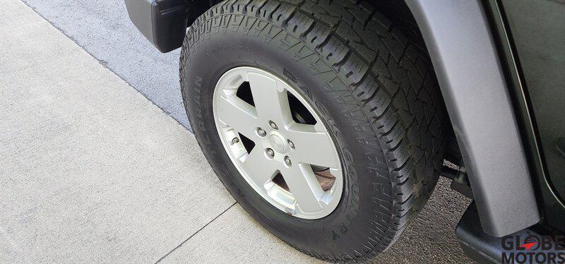 used 2010 Jeep Wrangler Unlimited car, priced at $12,995