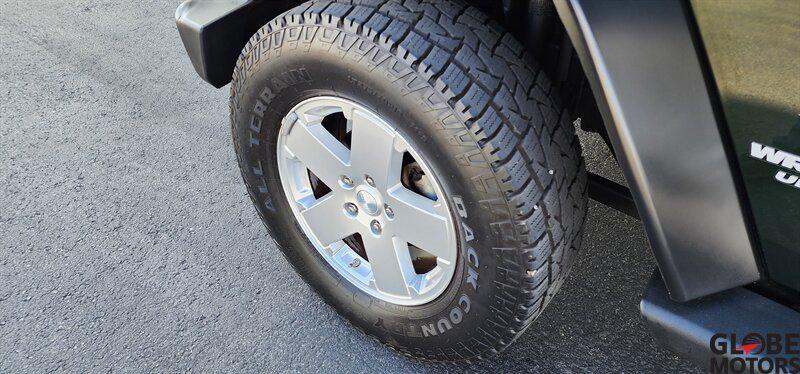 used 2010 Jeep Wrangler Unlimited car, priced at $13,995