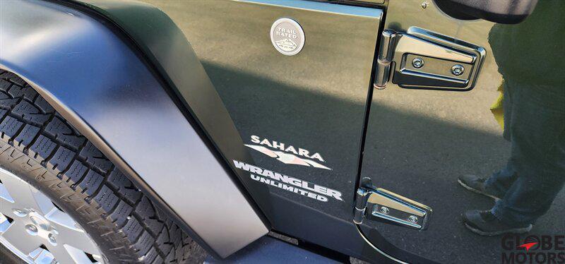 used 2010 Jeep Wrangler Unlimited car, priced at $13,995