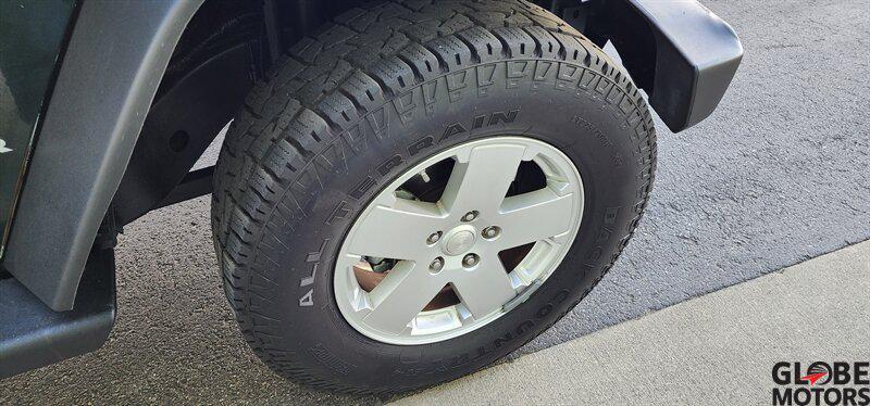used 2010 Jeep Wrangler Unlimited car, priced at $13,995