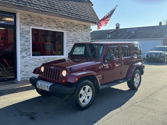 used 2012 Jeep Wrangler Unlimited car, priced at $13,999