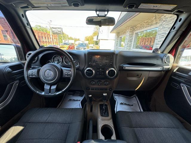 used 2012 Jeep Wrangler Unlimited car, priced at $13,999