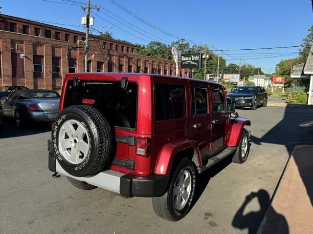 used 2012 Jeep Wrangler Unlimited car, priced at $13,999