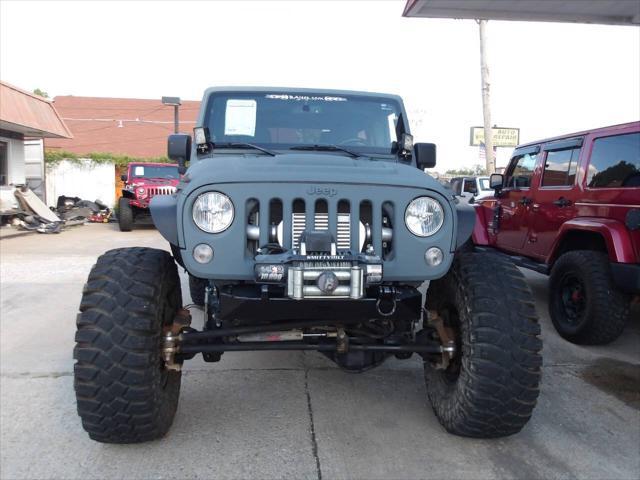 used 2014 Jeep Wrangler Unlimited car, priced at $32,950