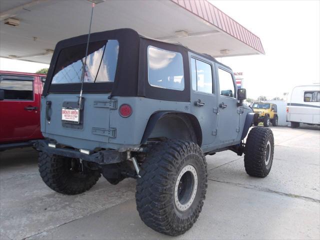 used 2014 Jeep Wrangler Unlimited car, priced at $32,950