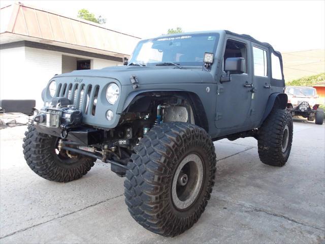 used 2014 Jeep Wrangler Unlimited car, priced at $32,950