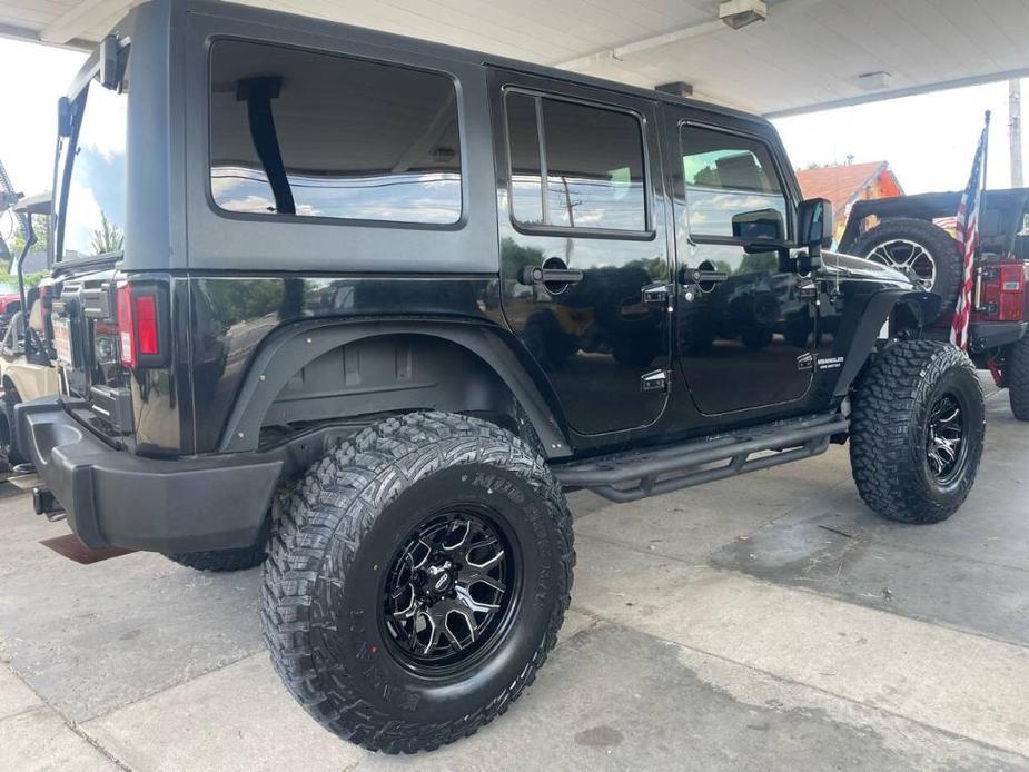 used 2015 Jeep Wrangler Unlimited car, priced at $20,950