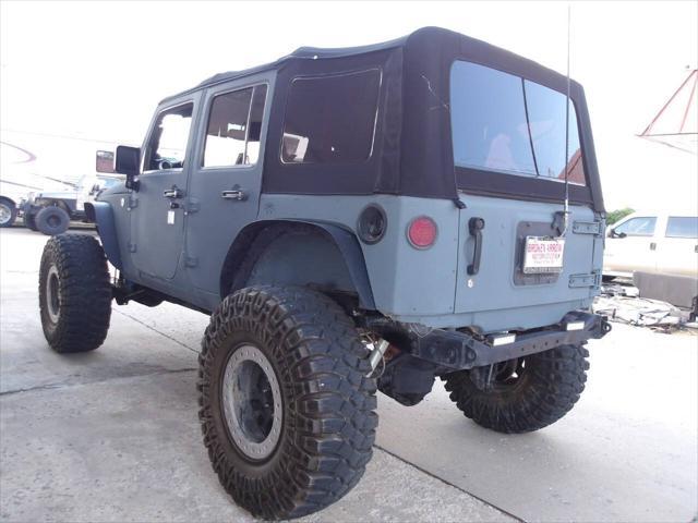 used 2014 Jeep Wrangler Unlimited car, priced at $31,950