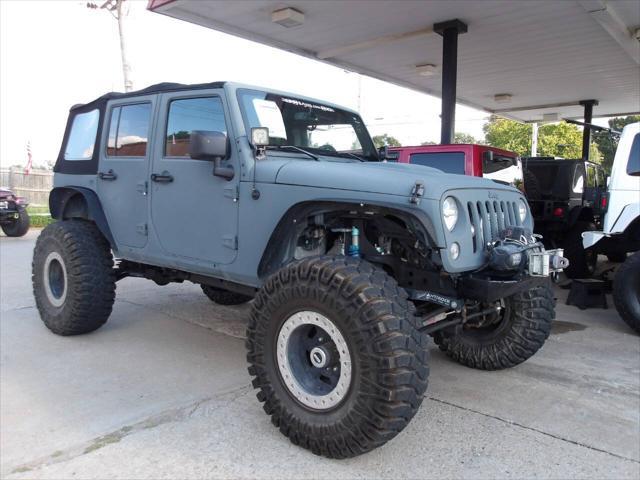 used 2014 Jeep Wrangler Unlimited car, priced at $31,950