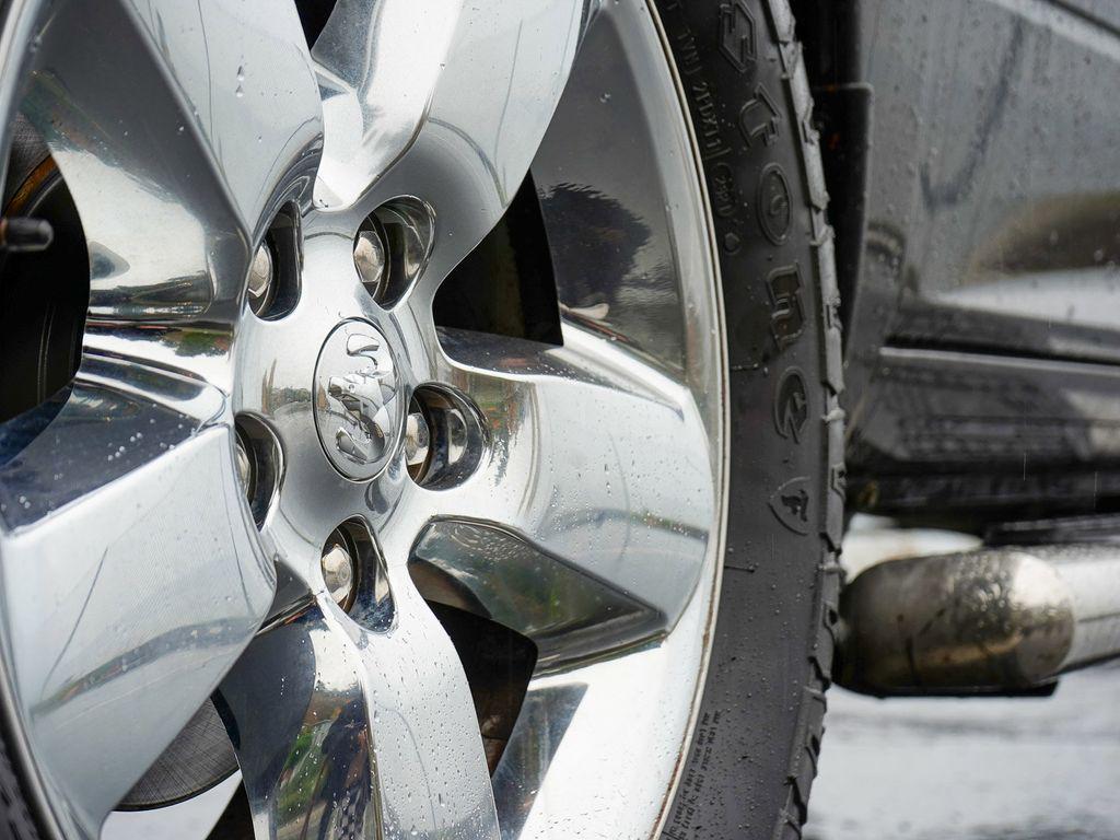 used 2018 Ram 1500 car, priced at $23,436