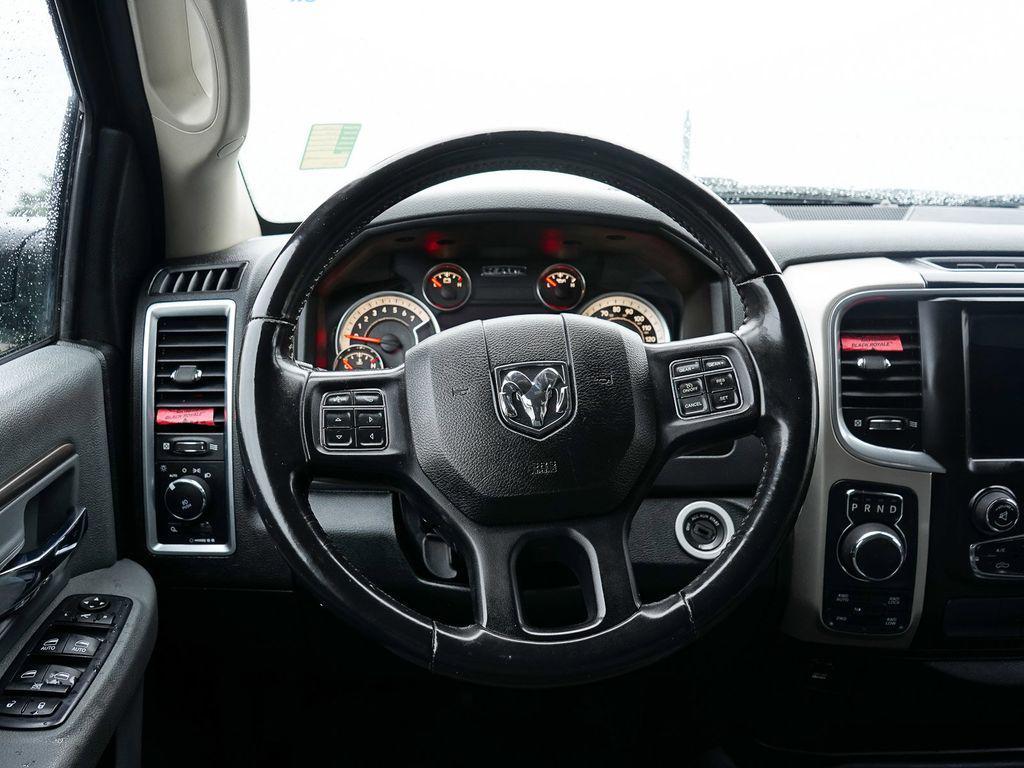 used 2018 Ram 1500 car, priced at $23,436