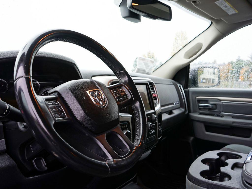 used 2018 Ram 1500 car, priced at $23,436