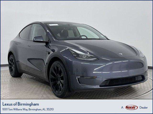 used 2023 Tesla Model Y car, priced at $30,499