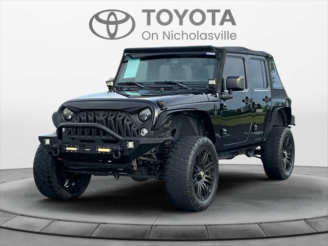 used 2015 Jeep Wrangler Unlimited car, priced at $15,495